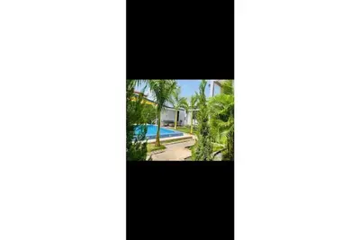 Image de Luxurious and comfortable 4 bedrooms house with a pool view bedroom