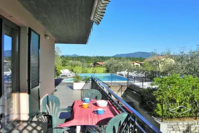Image de Apartment with swimming pool and soccer field parking lot with gate