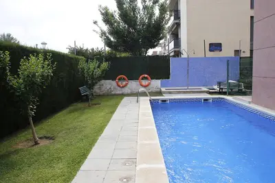 Image de At061 Estació: Apartamento céntrico con piscina comunitaria