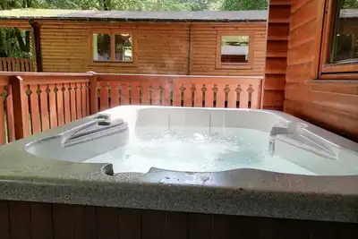 Image de Log cabin with hot tub and nestled in Kenwick Park, Louth