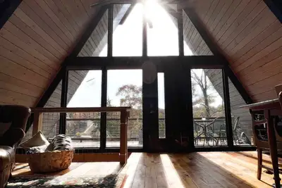 Image de Aframe 34 ~ dock + lake front + hot tub + fire pit + great views
