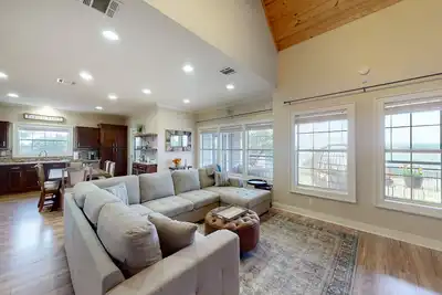 Charming spacious home with yard, game room, lake view & washer/dryer