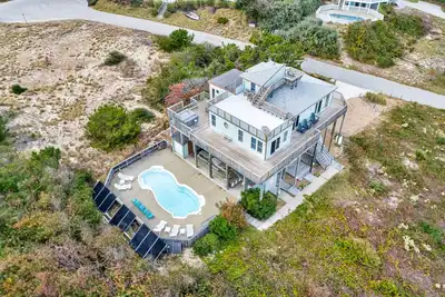 Ocean-view, dog-friendly home with two kitchens, pool, hot tub, & theater room