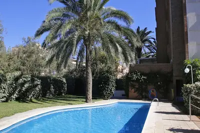 Image de At011 Les Palmeres: Apartamento en primera línea de mar con piscina comunitaria