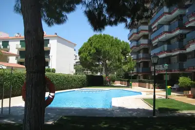 Image de At121 Protomar: Apartamento con piscina comunitaria a pocos metros de la playa
