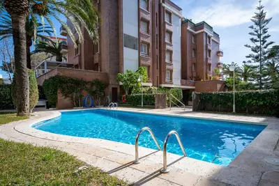 Image de At019 Les Palmeres: Apartamento con vistas frontales al mar y con piscina comunitaria