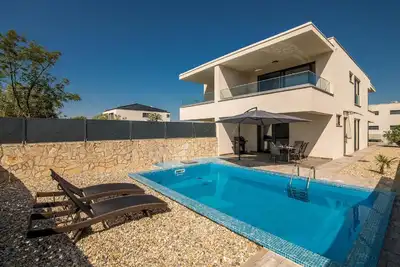 Image de Maison de vacances Malinska pour 1 - 5 personnes avec 3 chambres à coucher - Maison de vacances