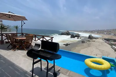 Image de Beachfront house over El Chanque hill with pool, barbecue area and amazing view