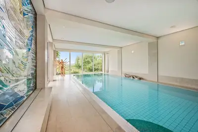 Image de Wellness Apartment mit Pool, Sauna, Fitness und Wasserblick