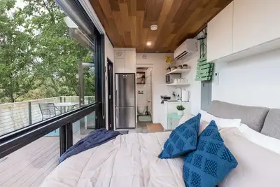 Riverside Tiny Cabin w Hot Tub, Fire Pit, & Kayaks