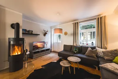 Image de Spacious apartment with fireplace in an idyllic location on the edge of the forest