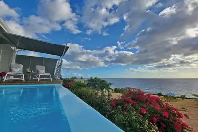 Image de Front de Mer des Caraïbes, vue et accès mer, piscine privée 'Villa Blue Haven 1'