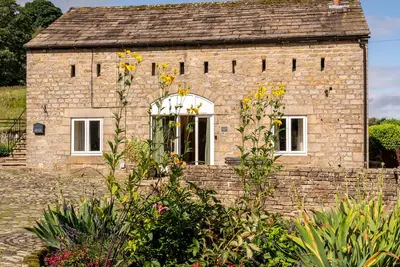 Image de A spacious property with a focus on socialising with far reaching tranquil views of the dales