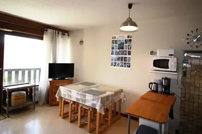 Image de Studio cabine 4 personnes au pied des pistes avec balcon et parking - Auris en Oisans