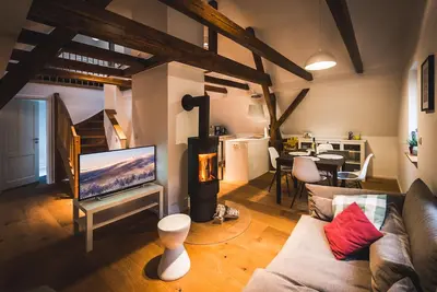 Image de Maisonette apartment on the top floor with fireplace on the edge of the forest