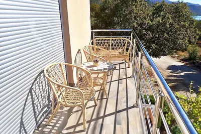 Image de Appartement de vacances avec climatisation et vue sur la mer