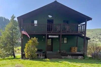 Image de Rustic Farmhouse on 206 acres with private trout stream running through it…