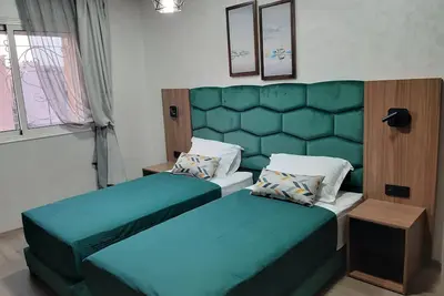 Image de Appartement Moderne en Résidence avec Piscine et Wi-Fi Gratuit  à 10 mn   Gueliz