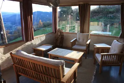 Image de Gîte avec vue panoramique depuis la véranda