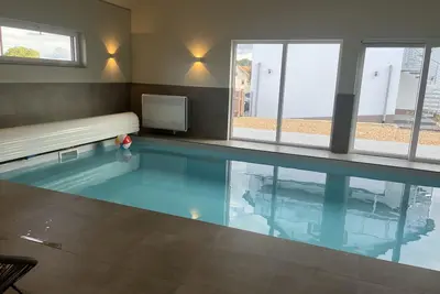 Image de Appartement neuf de 140 m² avec piscine intérieure chauffée à l'année et spa
