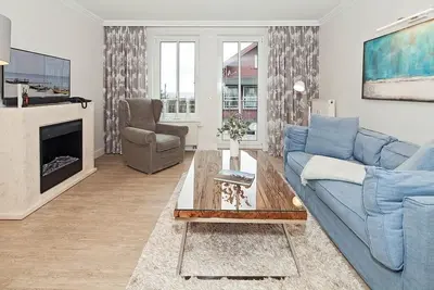 Image de HĂĽbsche, GemĂĽtliche Ferienwohnung mit Balkon und Meerblick in Toller Strandlage