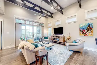 Image de Luxurious villa with outdoor Tv lounge, kitchen & alfresco dining space