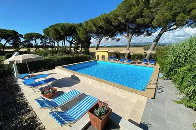 Image de Appartement 'Podere Nuti - 4 Lauro' avec piscine partagée, jardin partagé et Wi-Fi
