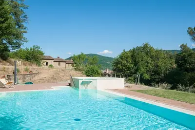 Image de Ferme \"Pilari Appartamento Stalla\" avec piscine partagée, terrasse privée et Wi-Fi.