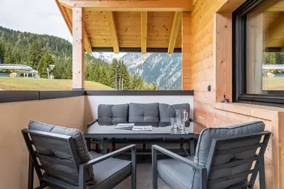 Image de Chalet « Blosegghof Almwiese » avec vue sur la montagne, terrasse privée et Wi-Fi