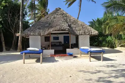 Image de Bungalow privé Zero minutes de la plage. Avec service 3*  eau gaz électr Wifi.