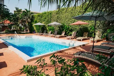 Image de 2 Bedroom Apartments | kitchen | Free Wifi | Daily Cleaning | Ac | Cable | Pool