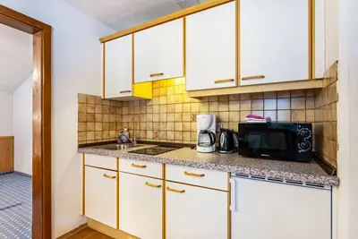 Image de Appartement \"Schwüwong - Apartment 04\" avec vue sur les montagnes, terrasse partagée et Wi-Fi.