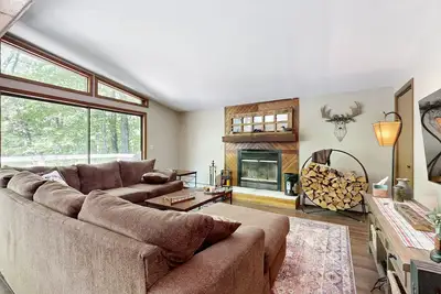 Secluded home with deck, hot tub, fireplace, woodstove, & foosball table