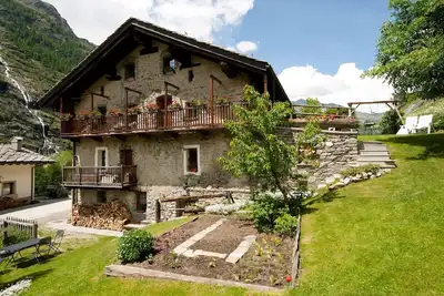 Image de Three-Room Baita with fireplace, terrace, garden 90mt from trails/ski slopes