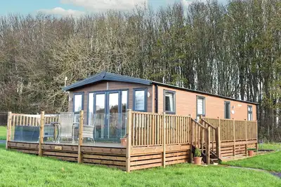 Image de This beautifully presented lodge is the perfect retreat for couples or a small family.