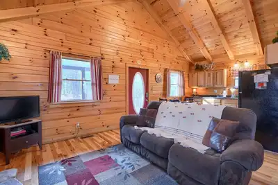 Quaint cabin nestled in the pines.