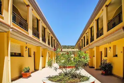 Image de Appartement à Villassimius avec jardin-anciennement Tui Ferienhaus
