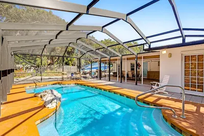 Single-level home with a private pool, enclosed yard - two dogs Ok