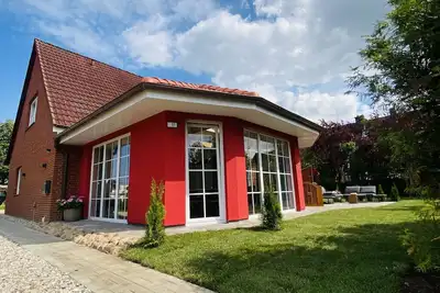 Image de Haus Nordlicht -holiday home for up to 20 people - 700m to the beach - field edge location