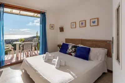 Image de Maison de vacances \"El Suizo\" avec vue sur la mer, terrasse privée et Wi-Fi.