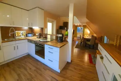 Image de Relaxation in Groß Schwansee with Baltic Sea view, sauna + Wlan - upstairs apartment