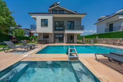 Image de Stunning 3 Bedroom Modern Villa, 2 miniutes by walk to Hisaronu by Villaboxturkey