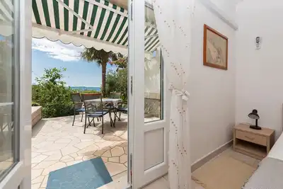 Image de Garçonnière avec la terrasse et la vue sur le mer Brela, Makarska (As-20186-a)
