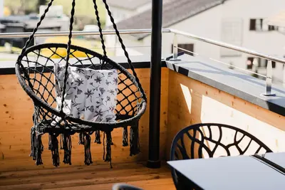 Image de Elegant 2-room vacation apartment (1st floor) with 49sqm & covered balcony, close to the lake