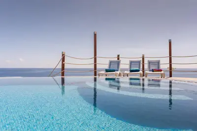 Image de A Luxury Retreat with Games Room, Spa, and Pool!