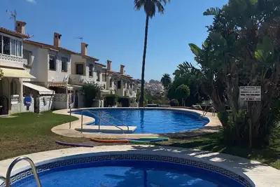 Image de family friendly villa/townhouse in an Urbanisation with shared pools - sea views