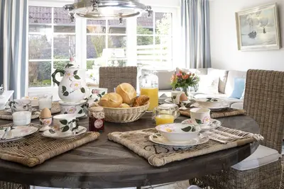 Image de Lillys Beachhouse with high-quality furnishings and sauna