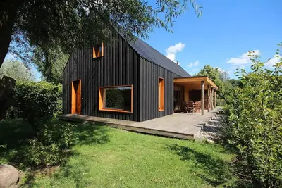 Image de Modern wooden house on the Bodden with two apartments that can be combined