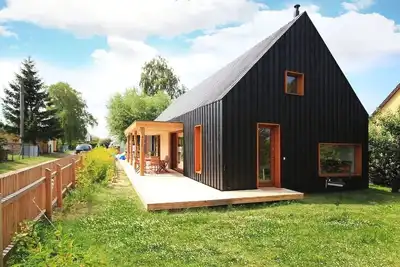 Image de Modern wooden house on the Bodden with two apartments that can be combined