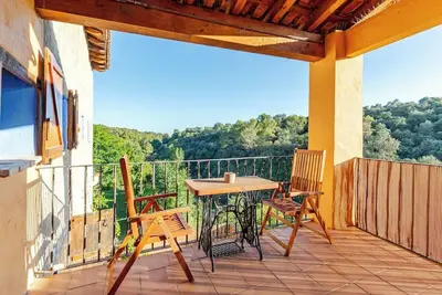 Image de Room with private living room, bathroom and terrace in a rural house